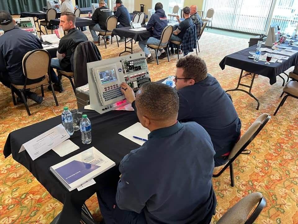 Rox Services technicians in factory training